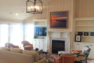 Beach style living room photo in Raleigh