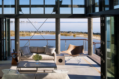 Example of a beach style living room design in DC Metro