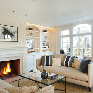 Mid-sized trendy formal and enclosed dark wood floor living room photo in San Francisco with beige walls, a standard fireplace, no tv and a plaster fireplace