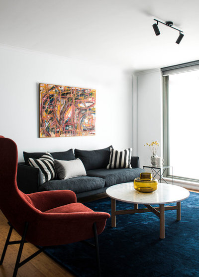 Eclectic Living Room by STUDIO OSCAR LEA.