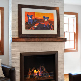 Inspiration for an eclectic living room remodel in New York with a standard fireplace and a brick fireplace