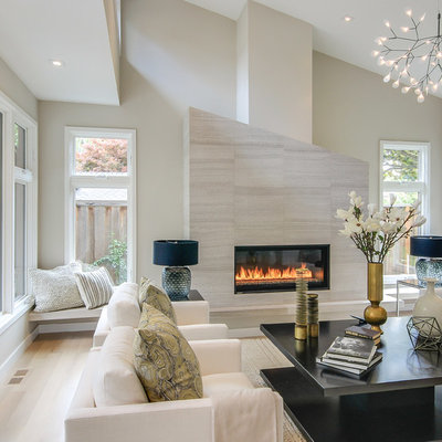 Large trendy formal and enclosed light wood floor and beige floor living room photo in San Francisco with beige walls, a tile fireplace, a ribbon fireplace and no tv