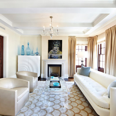 Large transitional formal and enclosed dark wood floor and brown floor living room photo in New York with beige walls, a standard fireplace, a wood fireplace surround and no tv