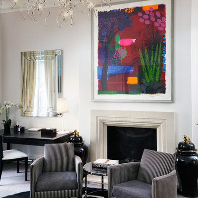 Living room - mid-sized contemporary formal and enclosed carpeted living room idea in London with white walls, a standard fireplace and a plaster fireplace