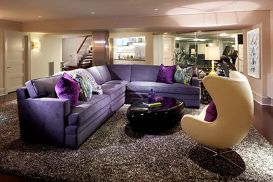 Example of a dark wood floor living room design in New York with beige walls