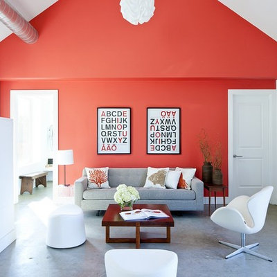 Example of a country concrete floor living room design in Providence
