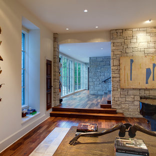 Example of an eclectic living room design in Austin with a music area