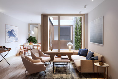 Foto de salón abierto moderno de tamaño medio con paredes beige, suelo de madera clara y suelo marrón
