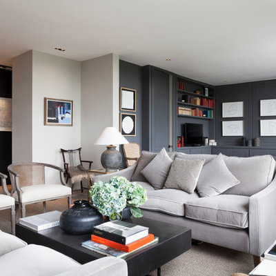 Inspiration for a mid-sized contemporary open concept living room remodel in London with blue walls