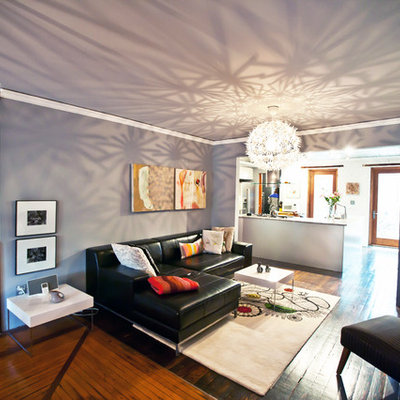 Inspiration for a contemporary living room remodel in New York with gray walls
