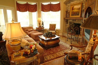 Example of a tuscan living room design in Houston
