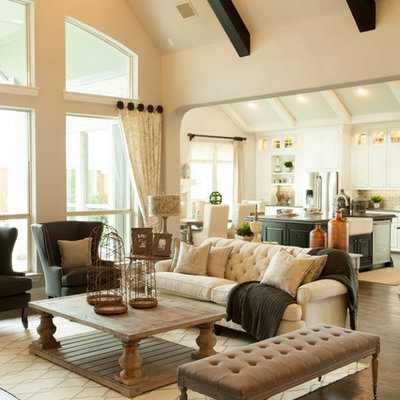 Example of a classic formal and open concept dark wood floor living room design in Dallas with beige walls
