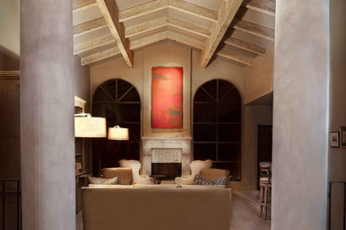 Imagen de salón para visitas abierto tradicional grande sin televisor con paredes beige, suelo de baldosas de terracota, todas las chimeneas y marco de chimenea de piedra