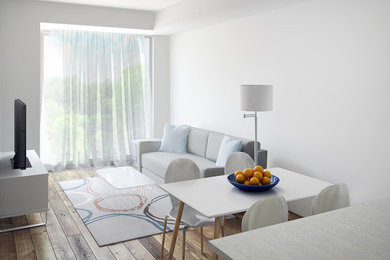 Inspiration for a mid-sized modern open concept light wood floor living room remodel in Toronto with white walls and a tv stand
