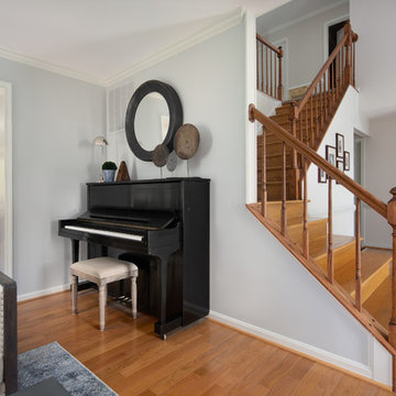 Piano + Living Room with Leather Back Chairs