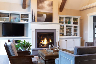 Example of a transitional living room design in Toronto