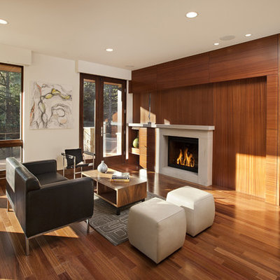 Inspiration for a modern open concept living room remodel in Denver with a standard fireplace