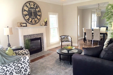 Example of a transitional living room design in Raleigh