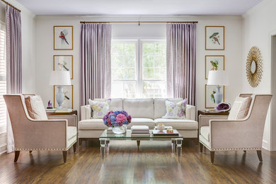 Inspiration for a mid-sized timeless enclosed medium tone wood floor living room remodel in Little Rock with white walls