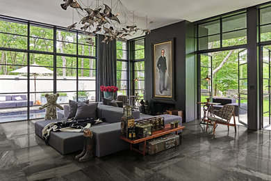 Classic open plan living room in DC Metro with porcelain flooring and black floors.