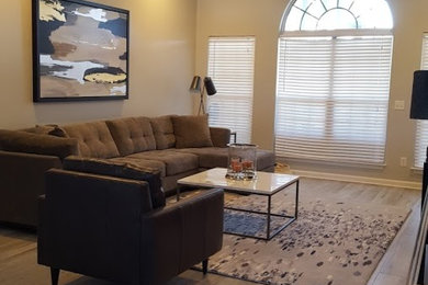 Inspiration for a transitional gray floor living room remodel in Atlanta with beige walls