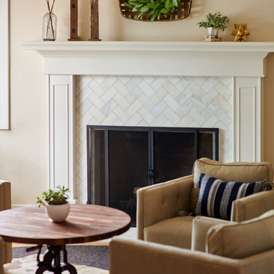 Living room - mid-sized transitional formal and open concept light wood floor and brown floor living room idea in Denver with beige walls, a standard fireplace, a tile fireplace and no tv