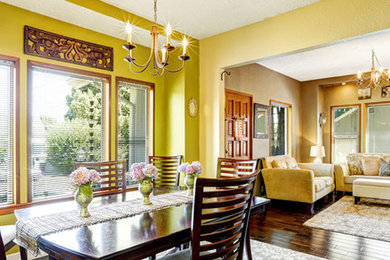 Open concept living room photo in Phoenix with yellow walls