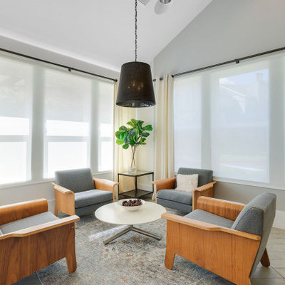Example of a mid-sized trendy formal and open concept gray floor living room design in Portland with gray walls