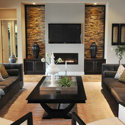 Trendy living room photo in Orlando with gray walls, a ribbon fireplace and a wall-mounted tv