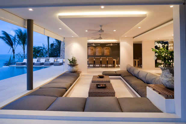 Tropical Living Room by Synergy Property Group