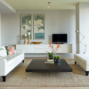 Living room - modern living room idea in Portland with gray walls and a tv stand