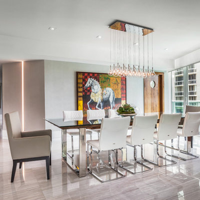 Inspiration for a large contemporary open concept linoleum floor living room remodel in Miami with no fireplace, white walls and a wall-mounted tv