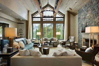 Living room - large contemporary living room idea in Other with beige walls, a standard fireplace and a stone fireplace