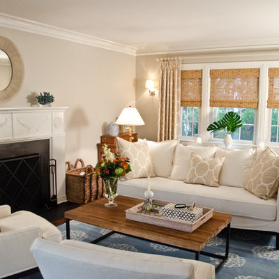 Living room - traditional living room idea in New York with beige walls, a standard fireplace and no tv