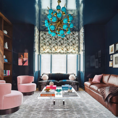 Living room - contemporary formal and enclosed medium tone wood floor and brown floor living room idea in San Francisco with blue walls, no fireplace and no tv