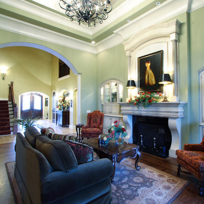 Elegant living room photo in Cincinnati with green walls