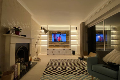 This is an example of a small contemporary living room in Sussex.