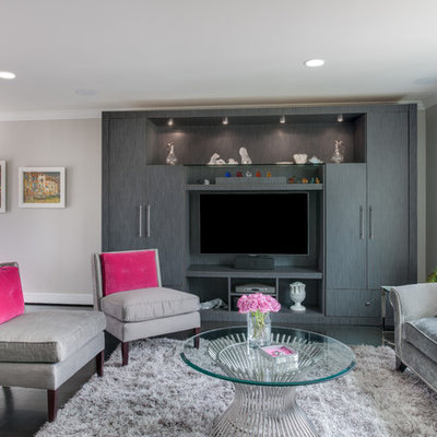Mid-sized trendy open concept dark wood floor and brown floor living room photo in DC Metro with gray walls, a media wall and no fireplace