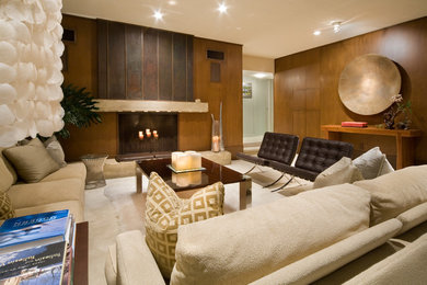 Immagine di un grande soggiorno moderno aperto con sala formale, pareti blu, moquette, camino classico, cornice del camino in legno e nessuna TV