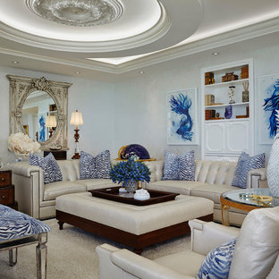Example of an ornate enclosed carpeted and beige floor living room design in Miami with beige walls
