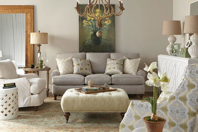 Medium sized classic formal enclosed living room in Birmingham with beige walls, medium hardwood flooring and brown floors.