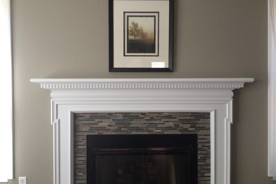 Mid-sized transitional formal and enclosed living room photo in Detroit with gray walls, a standard fireplace, a tile fireplace and no tv