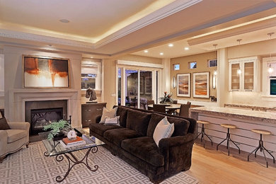 Inspiration for a mid-sized contemporary formal and open concept light wood floor living room remodel in Salt Lake City with beige walls, a standard fireplace, a stone fireplace and no tv