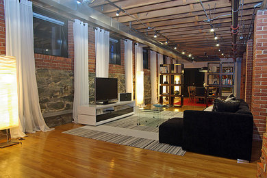 Living room - industrial living room idea in Boston