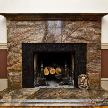 Rainforest Green Granite & Leathered Antique Brown Granite fireplace surround