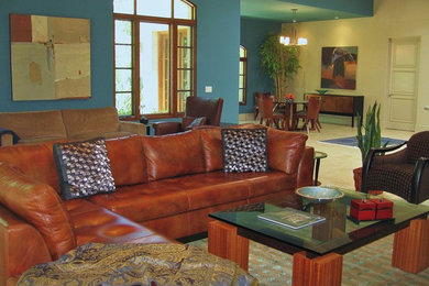 Large contemporary open plan living room in San Diego with blue walls, porcelain flooring and beige floors.