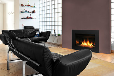 Inspiration for a contemporary living room remodel in Orange County with a standard fireplace