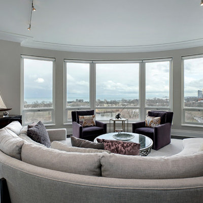 Trendy open concept dark wood floor living room photo in Chicago with gray walls and no tv