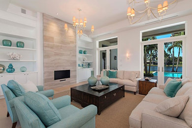 Großes, Repräsentatives, Fernseherloses, Abgetrenntes Klassisches Wohnzimmer ohne Kamin mit weißer Wandfarbe, braunem Holzboden und braunem Boden in Miami