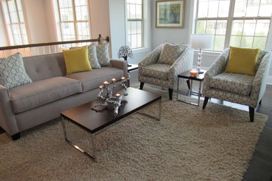 This is an example of a medium sized traditional formal open plan living room in Philadelphia with beige walls, carpet, a standard fireplace and no tv.